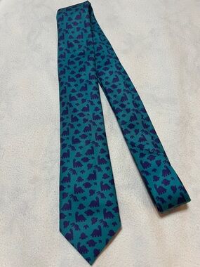KNOTTY Teal Tie with Navy Dinosaur Pattern
HANDMADE IN THE USA